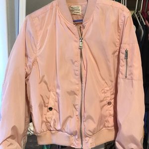 A pale pink almost new bomber jacket